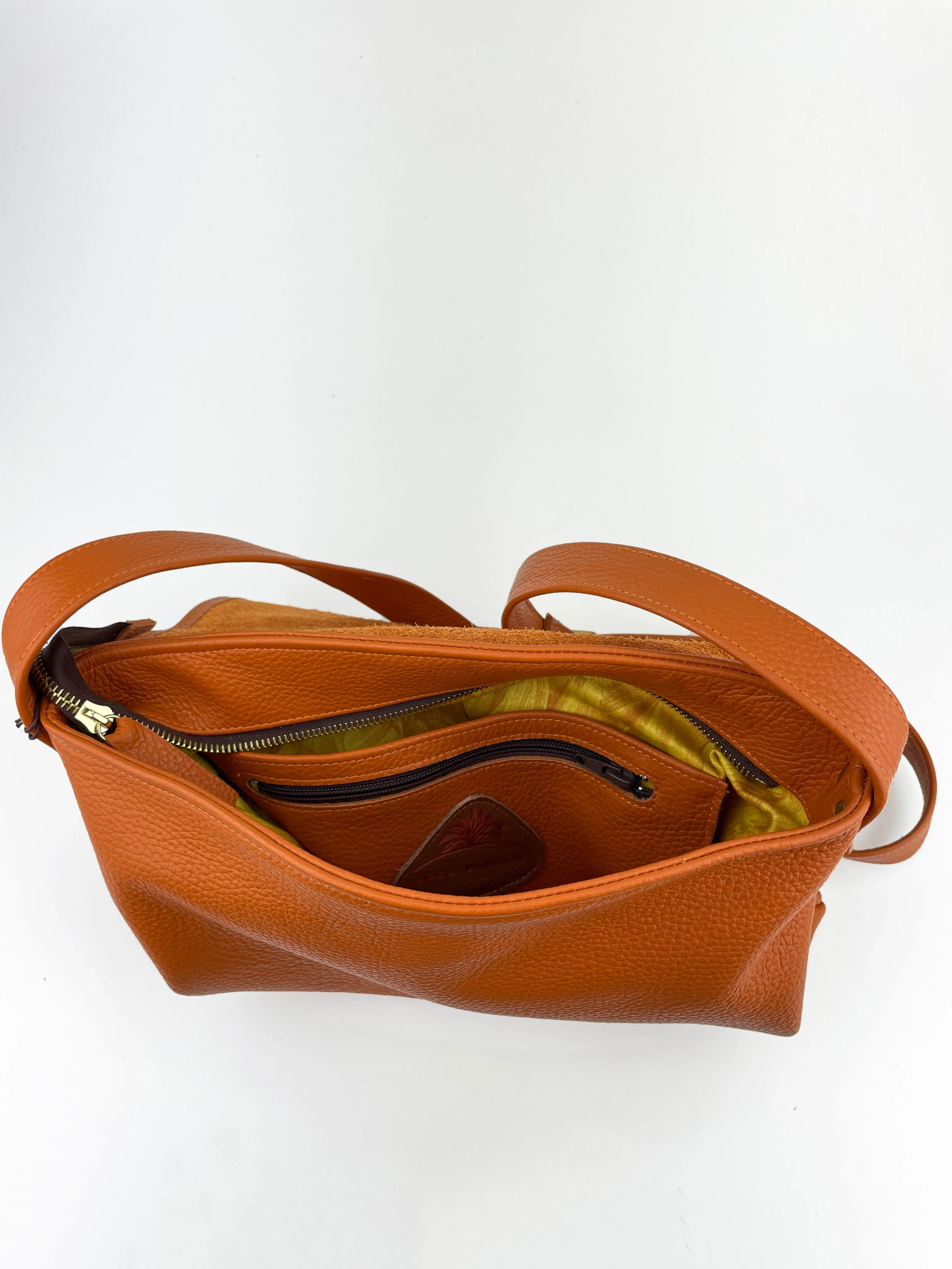 Minny Satchel  in orange pebble leather